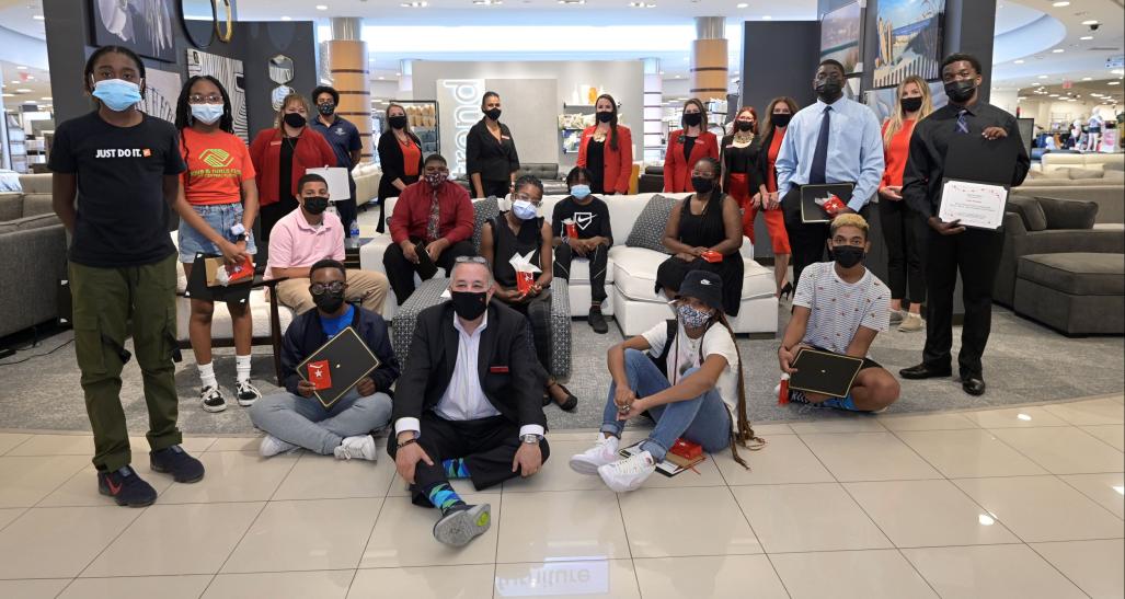 Students post at Macy's